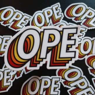 "OPE" sticker in an all-caps sans-serif font