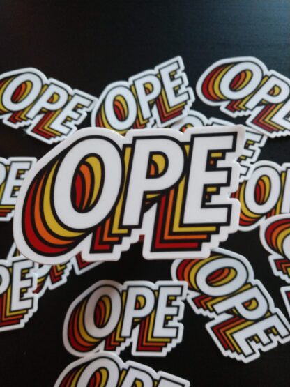 "OPE" sticker in an all-caps sans-serif font